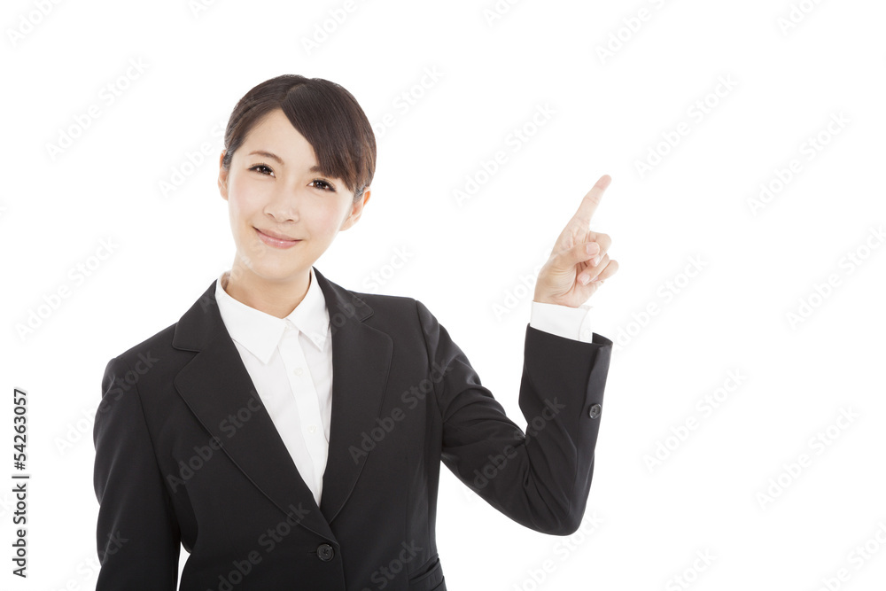 smiling business woman pointing to copy space smiling business woman pointing to copy space