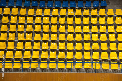 Wallpaper Mural Plenty of yellow and blue plastic seats at stadium . Torontodigital.ca