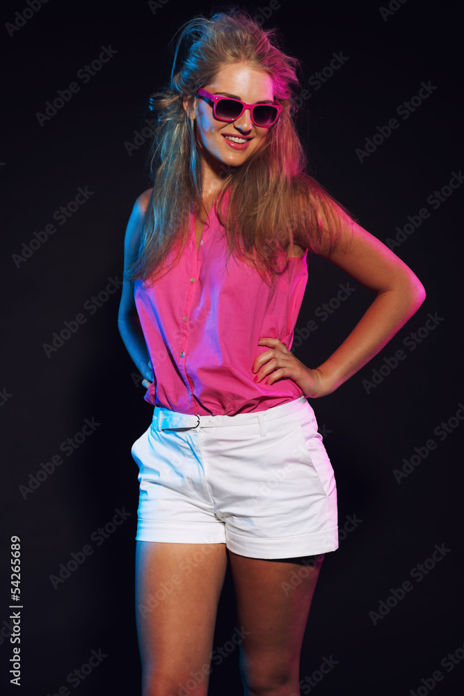 Foto de Sexy retro 80s fashion disco girl with long blonde hair