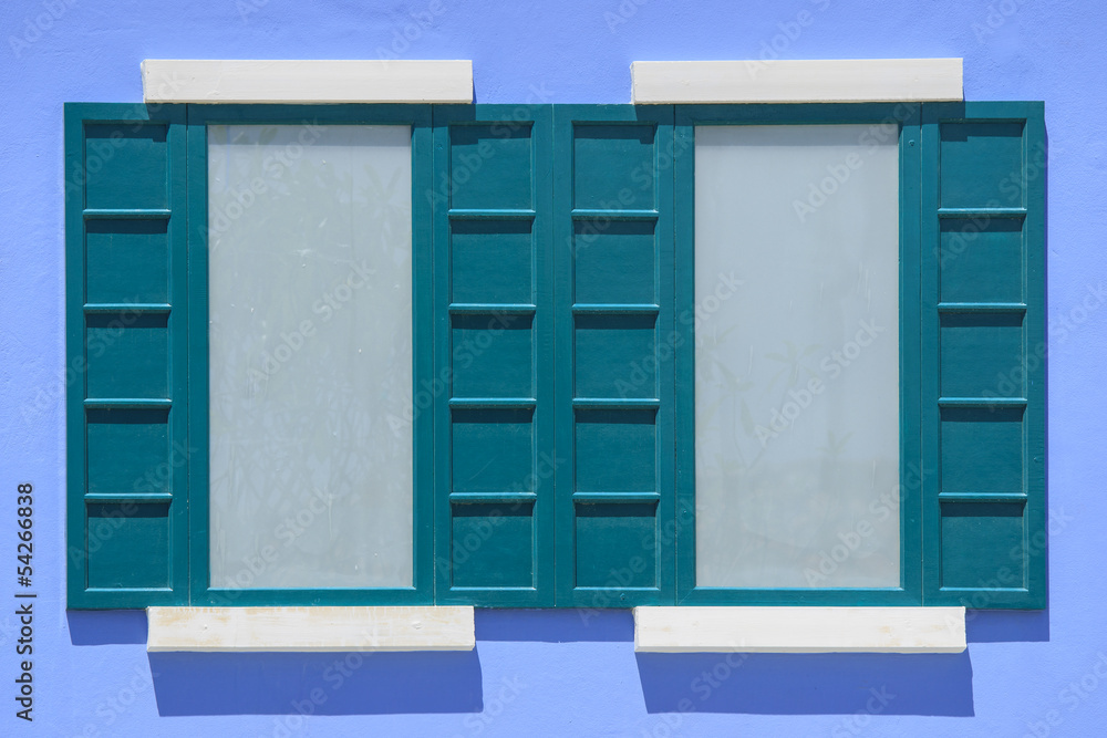 Fototapeta premium vintage windows on the blue wall