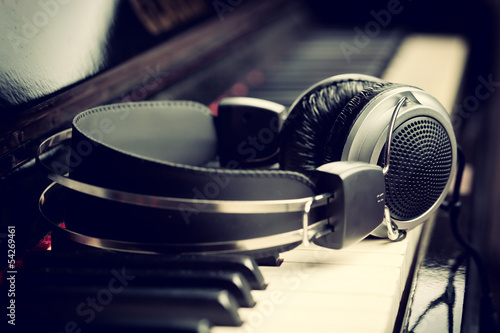 Piano keyboard and headphones, music concept.