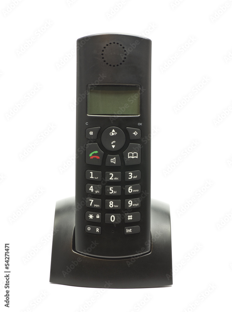 Cordless phone in cradle on white background. Cordless phone in cradle on white background.