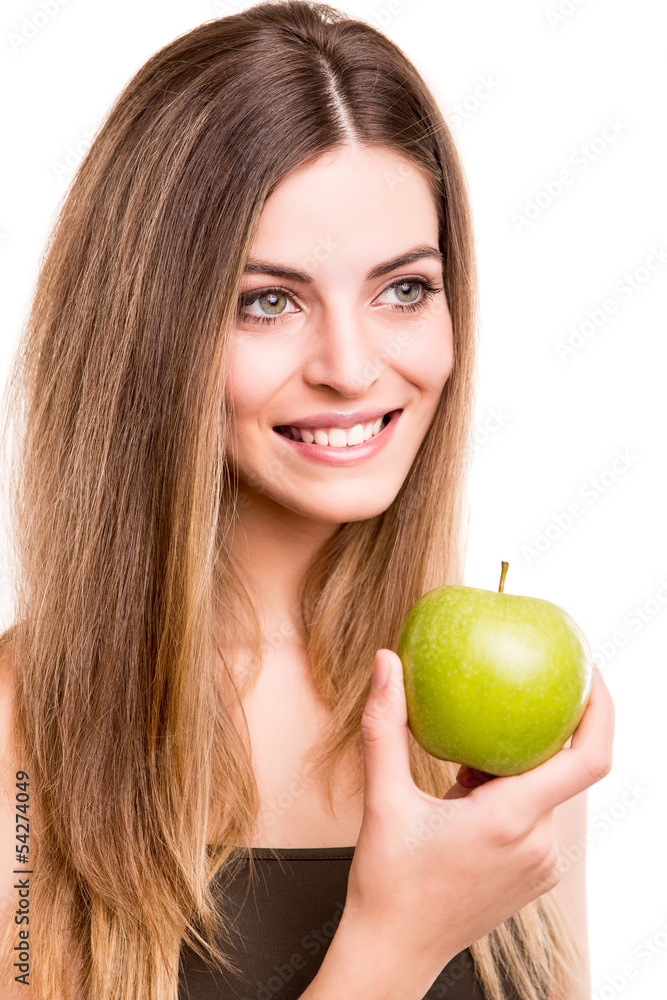 Portrait of a young woman eating green apple Portrait of a young woman eating green apple
