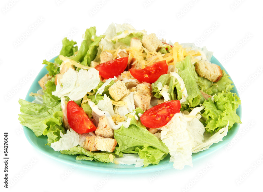 Caesar salad on blue plate, isolated on white Caesar salad on blue plate, isolated on white
