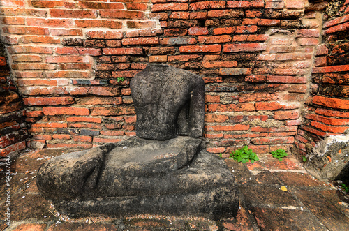 Ancient Buddha sculpture in Thailand photo