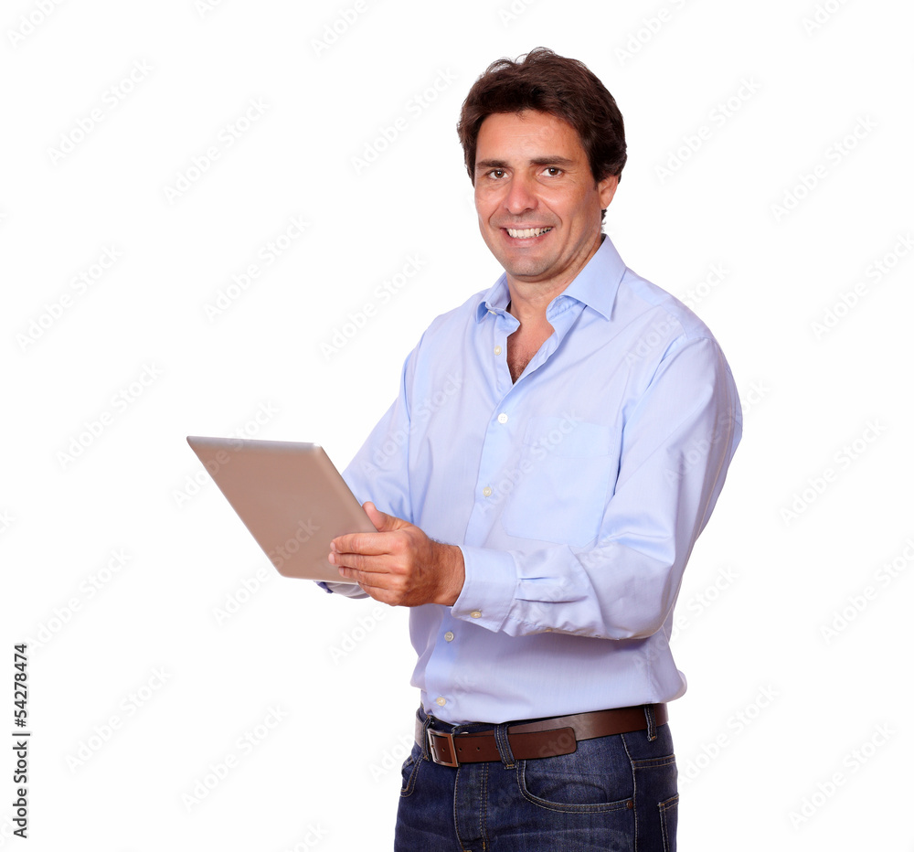 Charming male adult working on tablet pc Charming male adult working on tablet pc