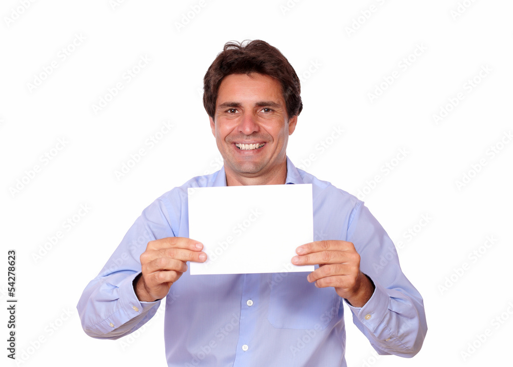 Charming positive man holding a blank card Charming positive man holding a blank card