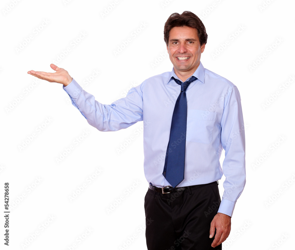 Stylish businessman with tie holding palm out Stylish businessman with tie holding palm out