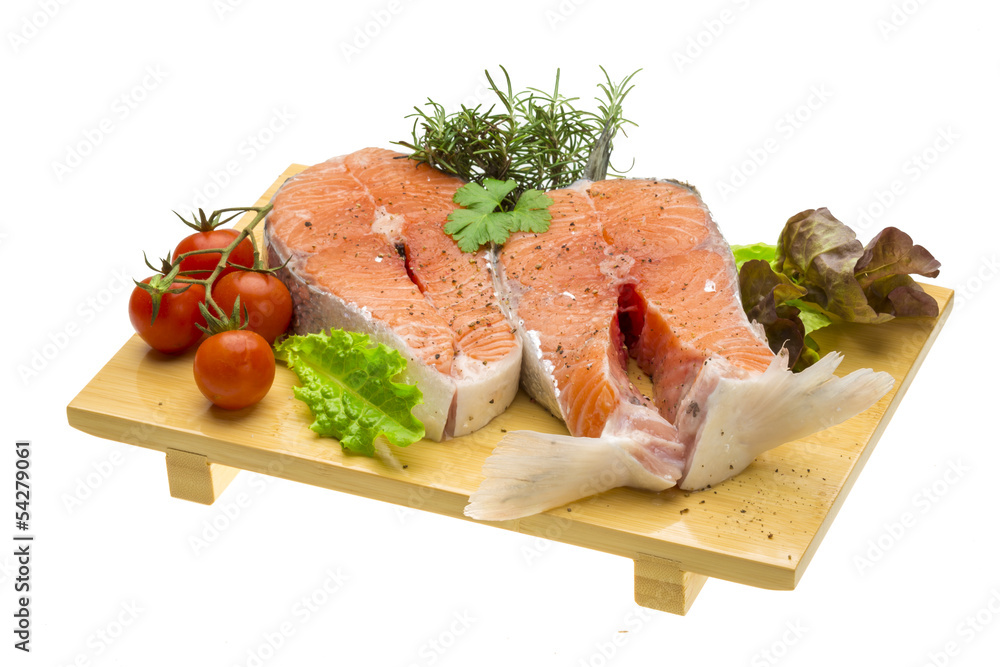 Raw fresh bright salmon with vegetables Raw fresh bright salmon with vegetables