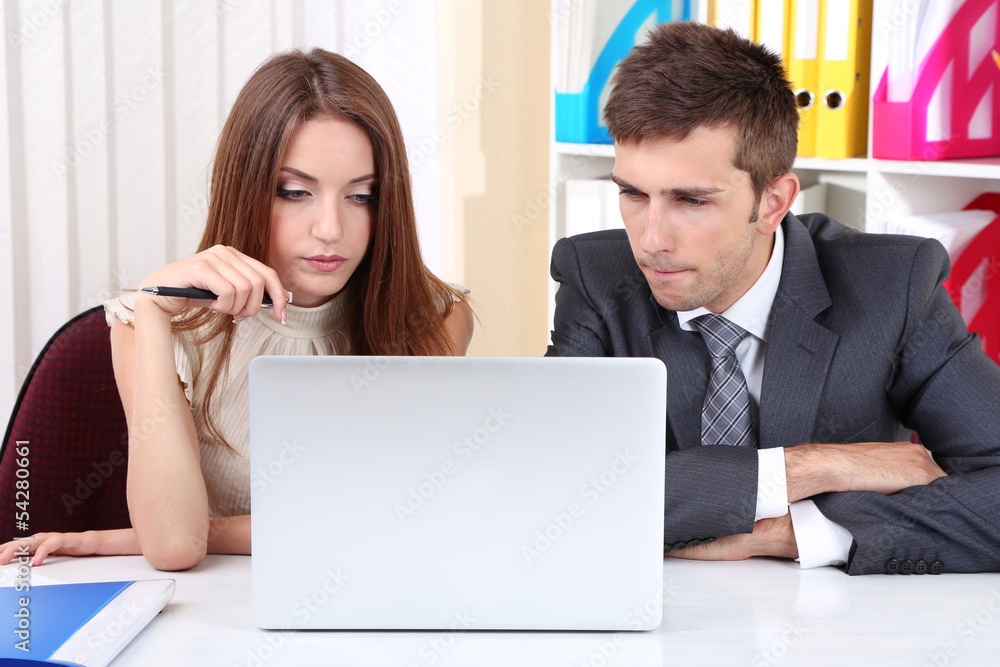 Business colleagues working together in office Business colleagues working together in office