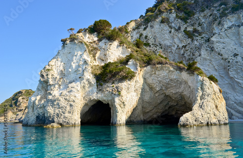 caves on Marathonisi island in Greece