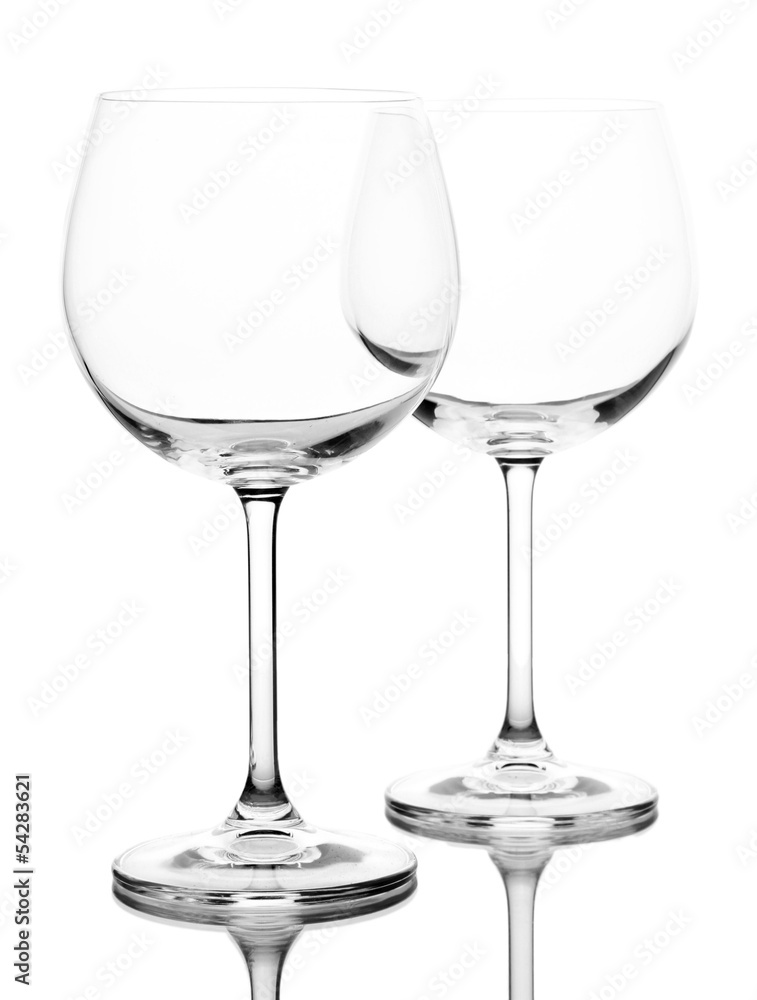 Empty wine glasses arranged and isolated on white Empty wine glasses arranged and isolated on white