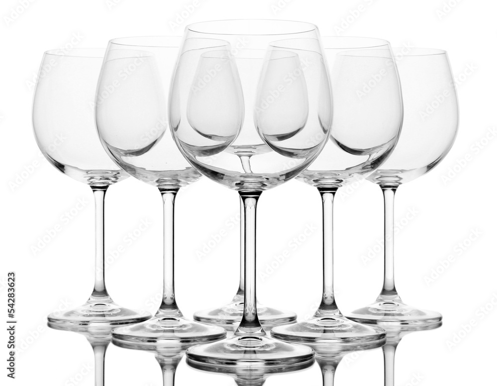 Empty wine glasses arranged and isolated on white Empty wine glasses arranged and isolated on white