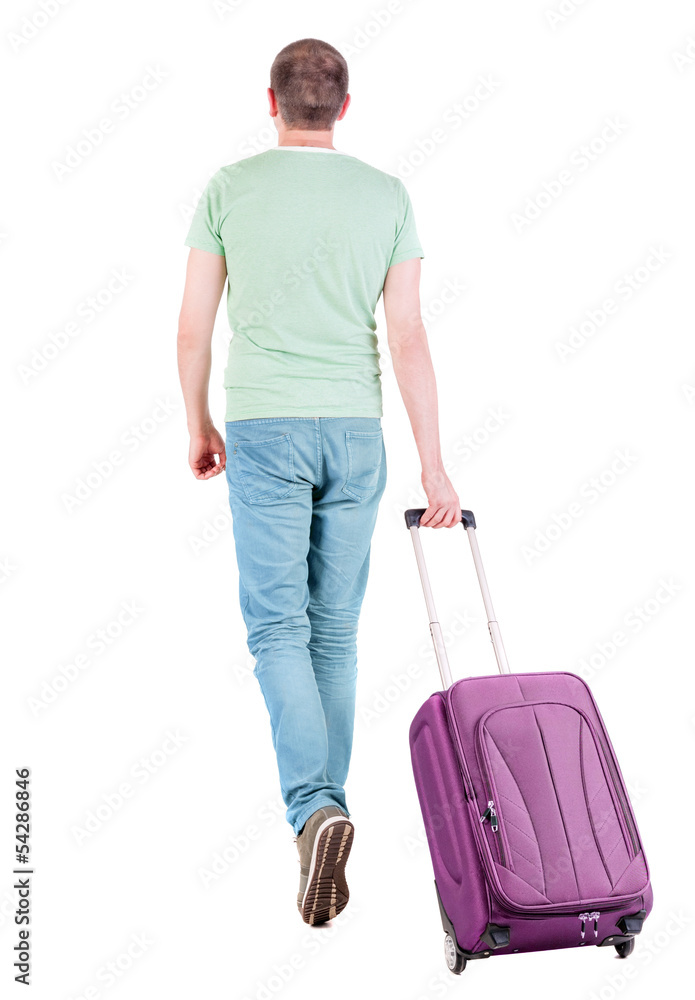 back view of walking man with suitcase. back view of walking man with suitcase.