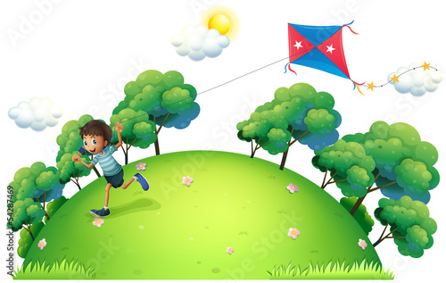 A boy flying a kite