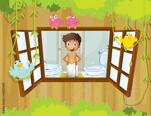 A boy with a towel at the comfort room  watching the birds outsi