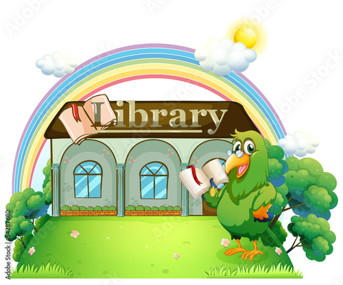 A green parrot reading outside the library