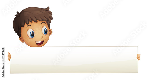 A small boy holding an empty banner