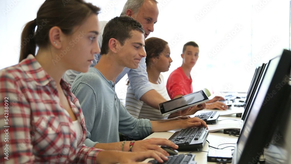 Group of young people in computing class