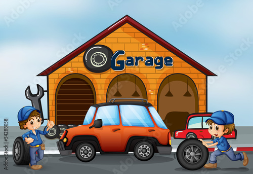 Two boys working at the garage