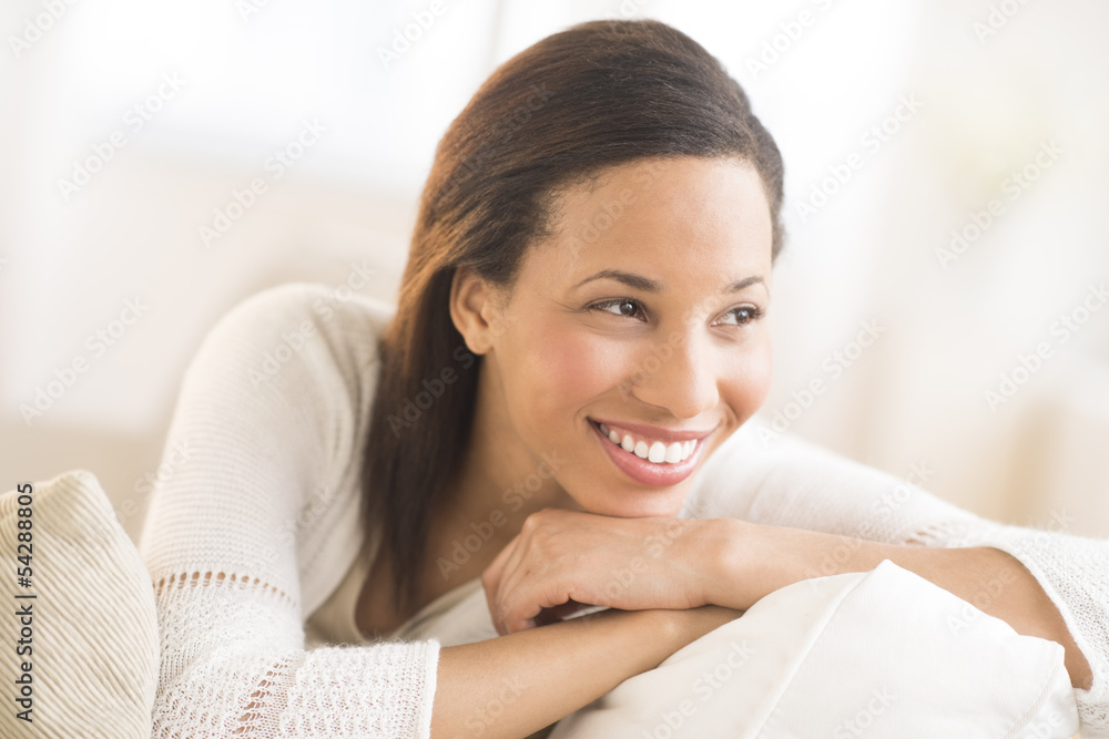 Woman With Hand On Chin Looking Away At Home Woman With Hand On Chin Looking Away At Home