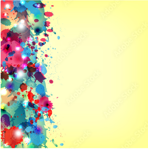 multicolored paint spots on a yellow background