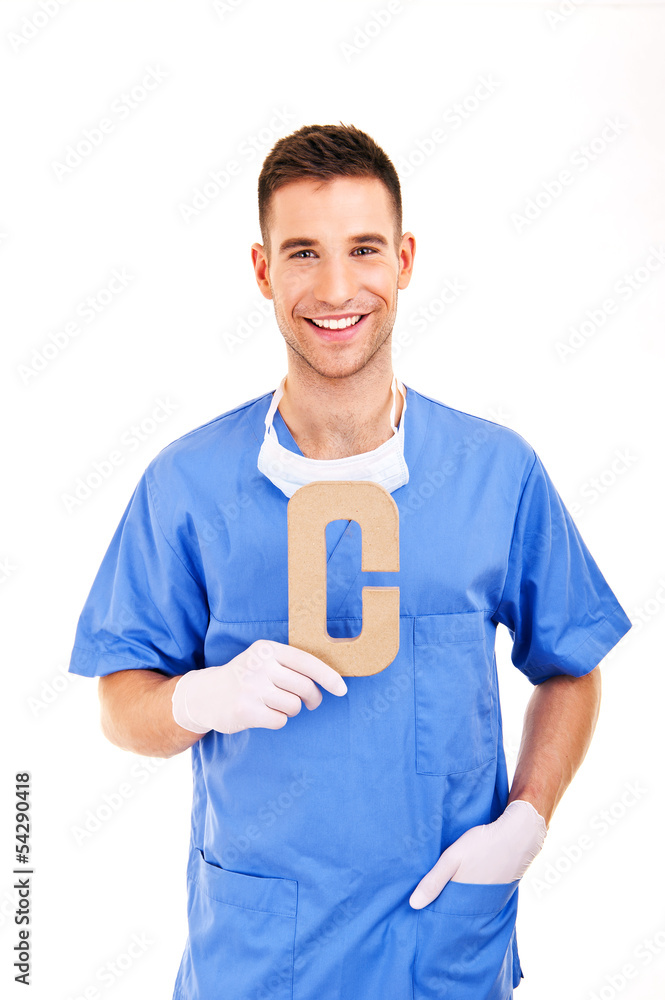 young doctor holding letter c young doctor holding letter c