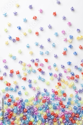 Colorful plastic stars on a white background