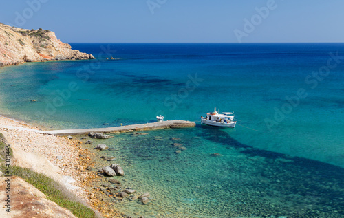 Fishing boats and coastal scenery in Milos island, Greece