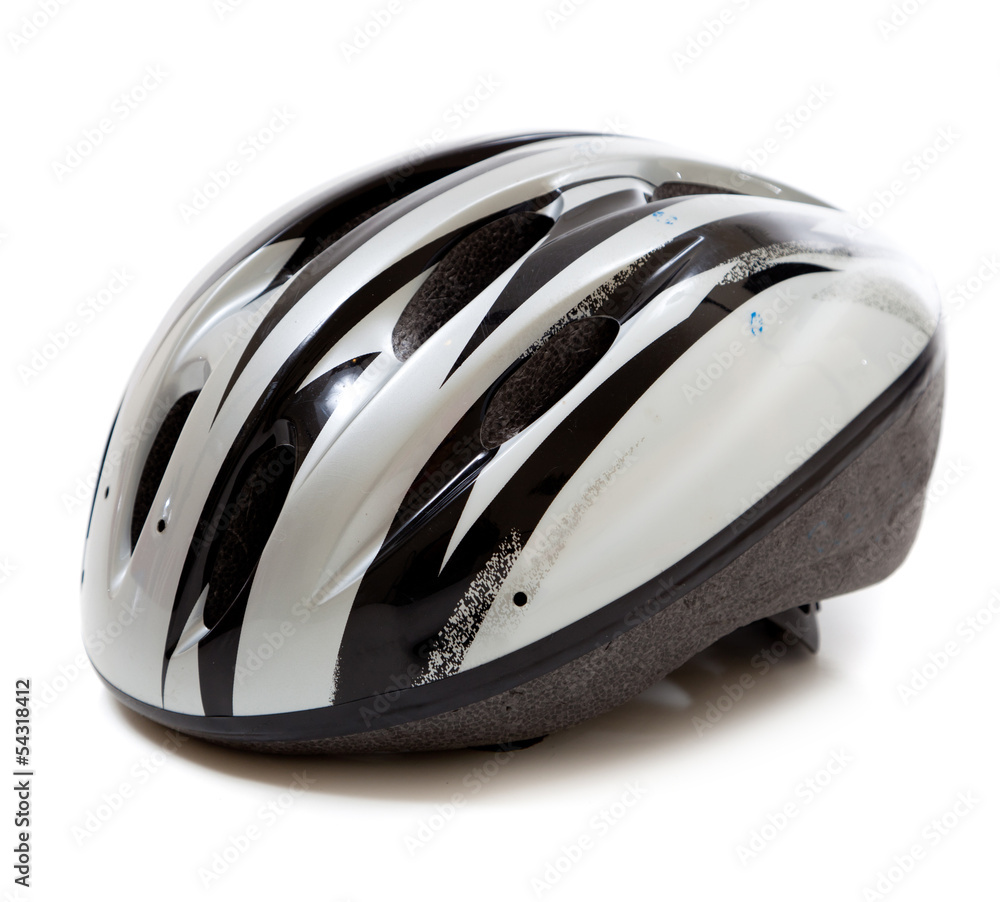 A gray bike helmet on a white background A gray bike helmet on a white background