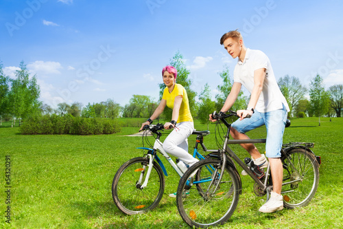 Two people on bikes