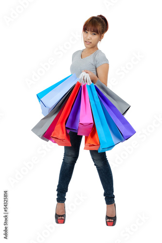 young asian woman with colorful shopping bags