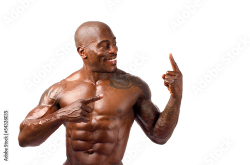 Strong bodybuilder man with perfect abs, shoulders,biceps, chest