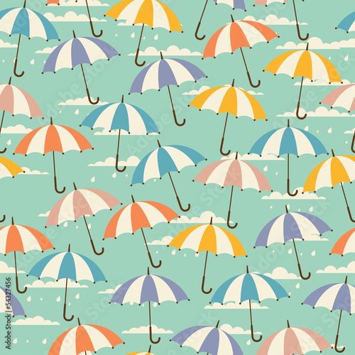 Seamless pattern in retro style with umbrellas.