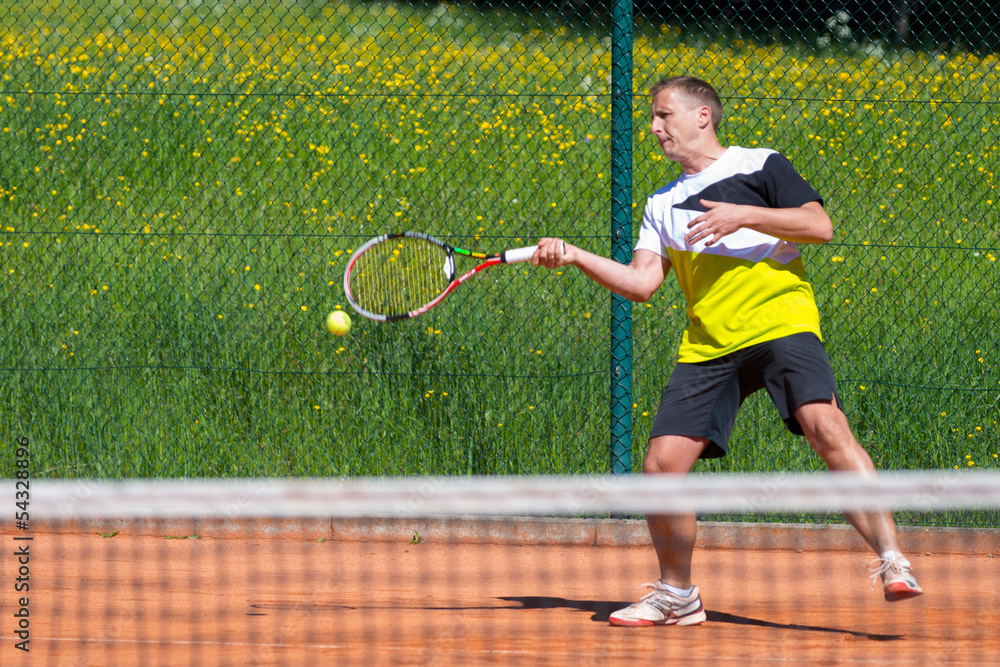ball leaves racket after forehand of tennis player