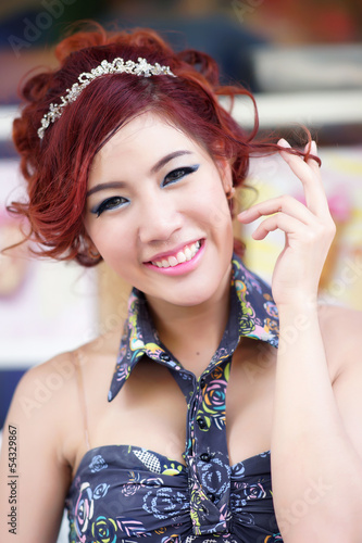 Portrait of young attractive female, outdoor shoot photo