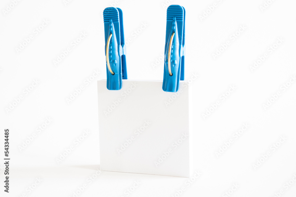 note with blue clothespins note with blue clothespins