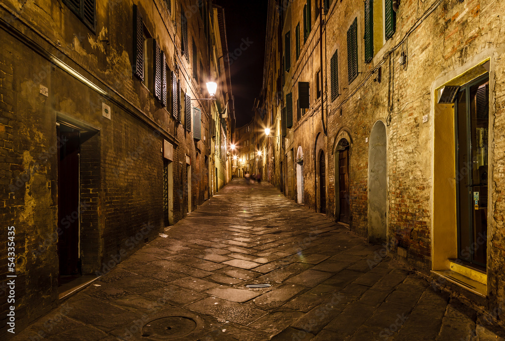 Narrow Alley With Old Buildings In Medieval Town of Siena, Tusca