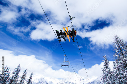 Ski lift against blue sky