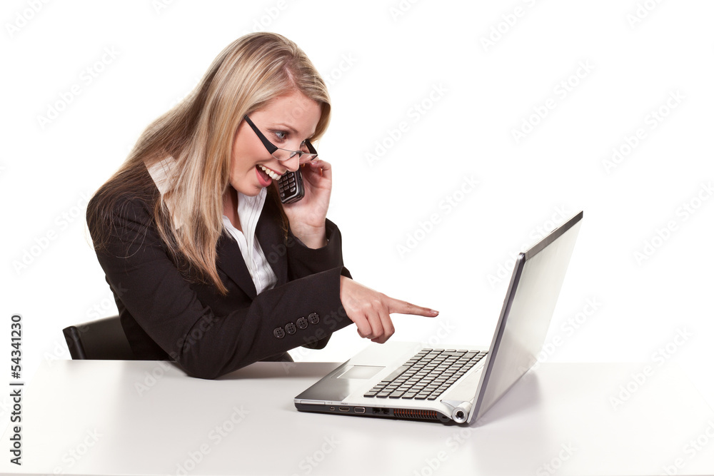 laughing woman in front of a computer laughing woman in front of a computer