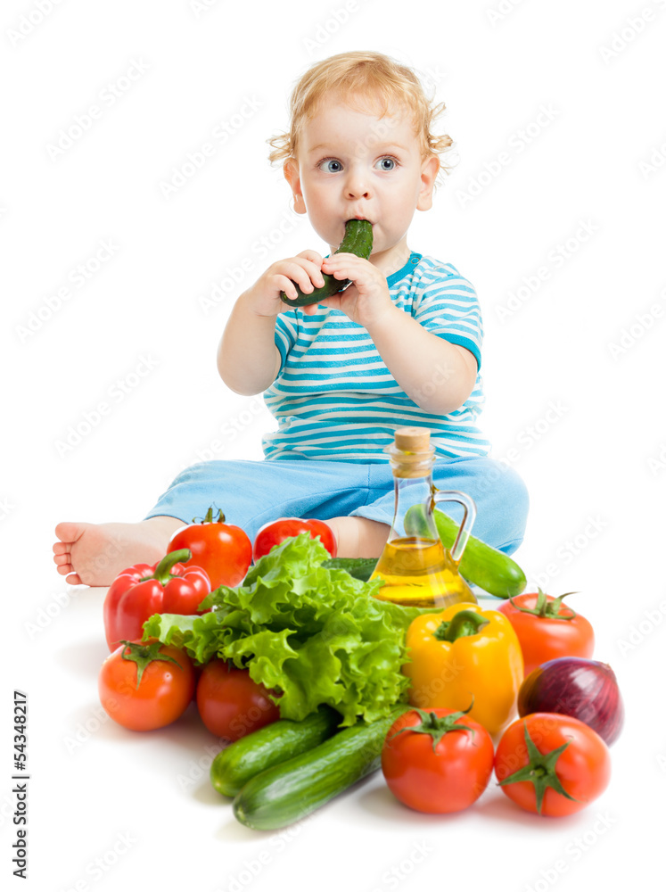 baby eating healthy food vegetables on white background baby eating healthy food vegetables on white background