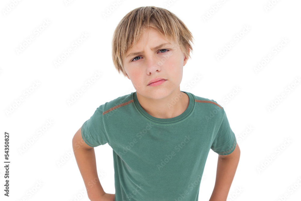 Furious little boy looking at camera Furious little boy looking at camera