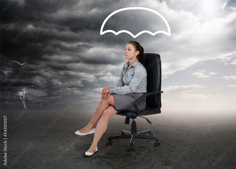 Umbrella graphic above the head of a businesswoman Umbrella graphic above the head of a businesswoman