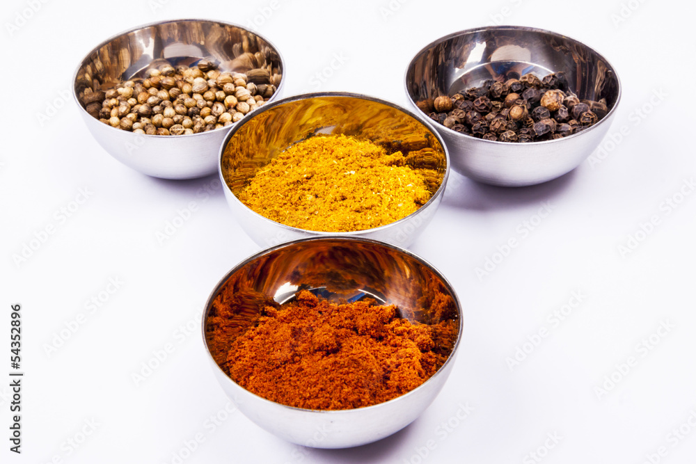 Curry, pepper, paprika and coriander - white background. Curry, pepper, paprika and coriander - white background.