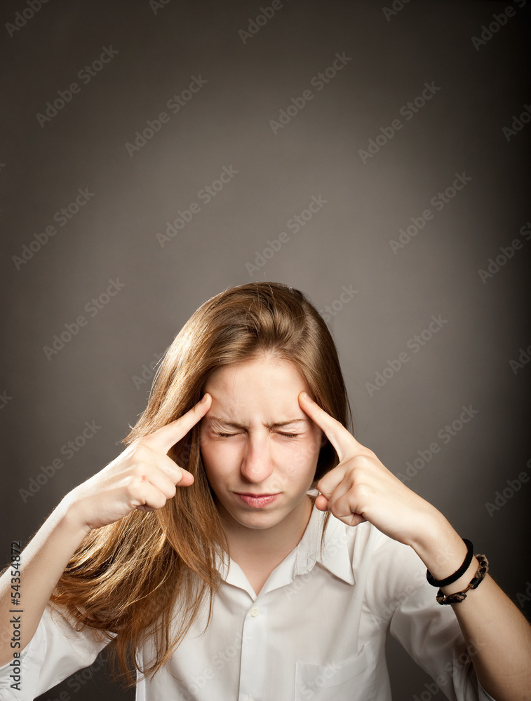 portrait of young concentrated woman thinking portrait of young concentrated woman thinking