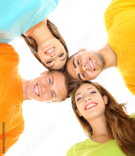 Happy group of beautiful young people  isolated on white