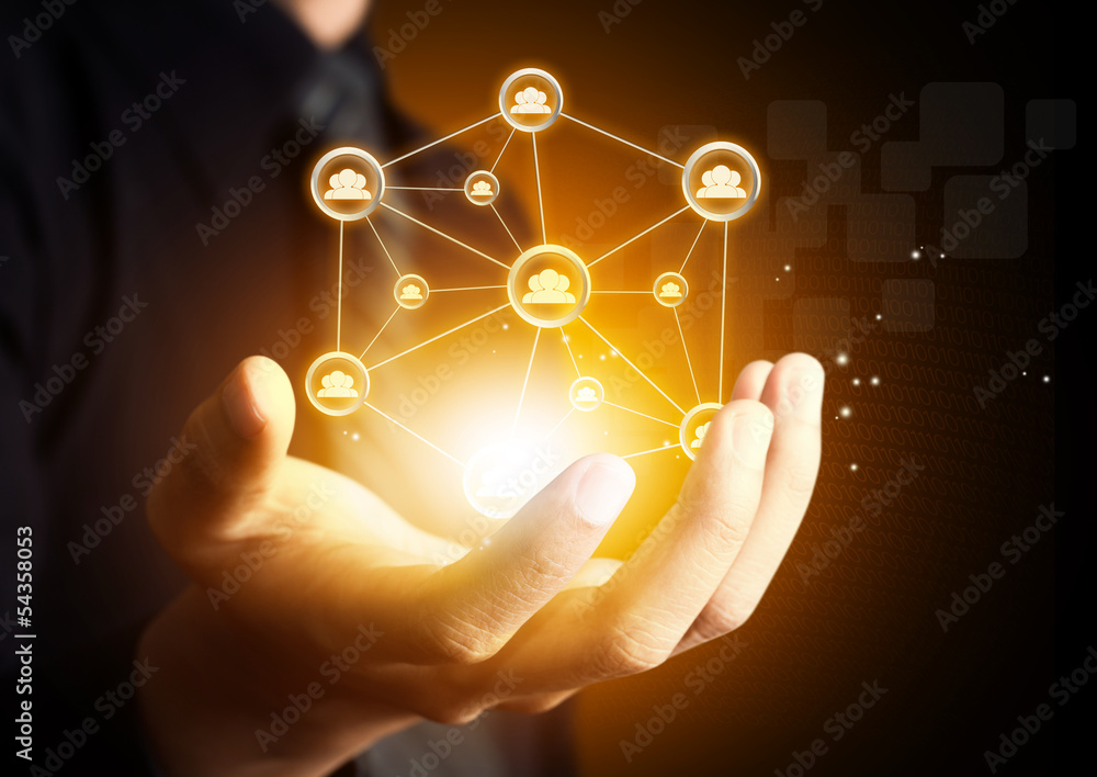 Male hand holding virtual icon of social network Male hand holding virtual icon of social network