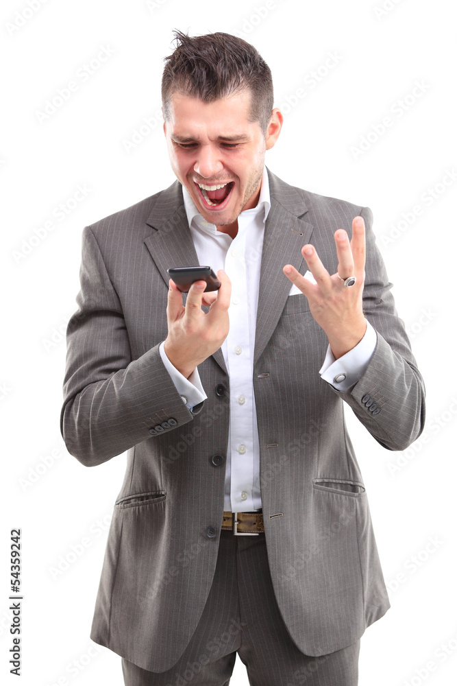 Angry business man screaming on cell mobile phone Angry business man screaming on cell mobile phone
