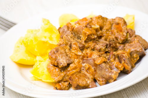 chicken livers in a creamy sauce with potato