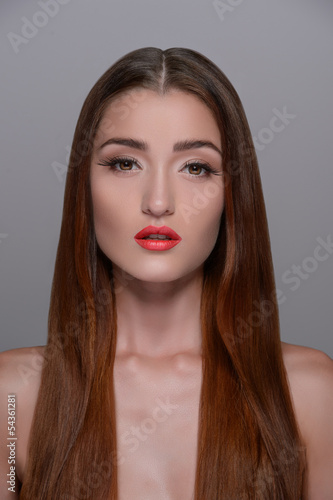 Pure beauty. Portrait of beautiful girl with smooth gloss long h